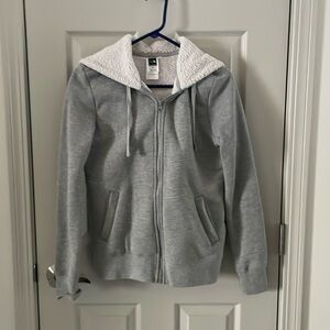 Women's North Face size small gray hooded sweatshirt with Sherpa lining.